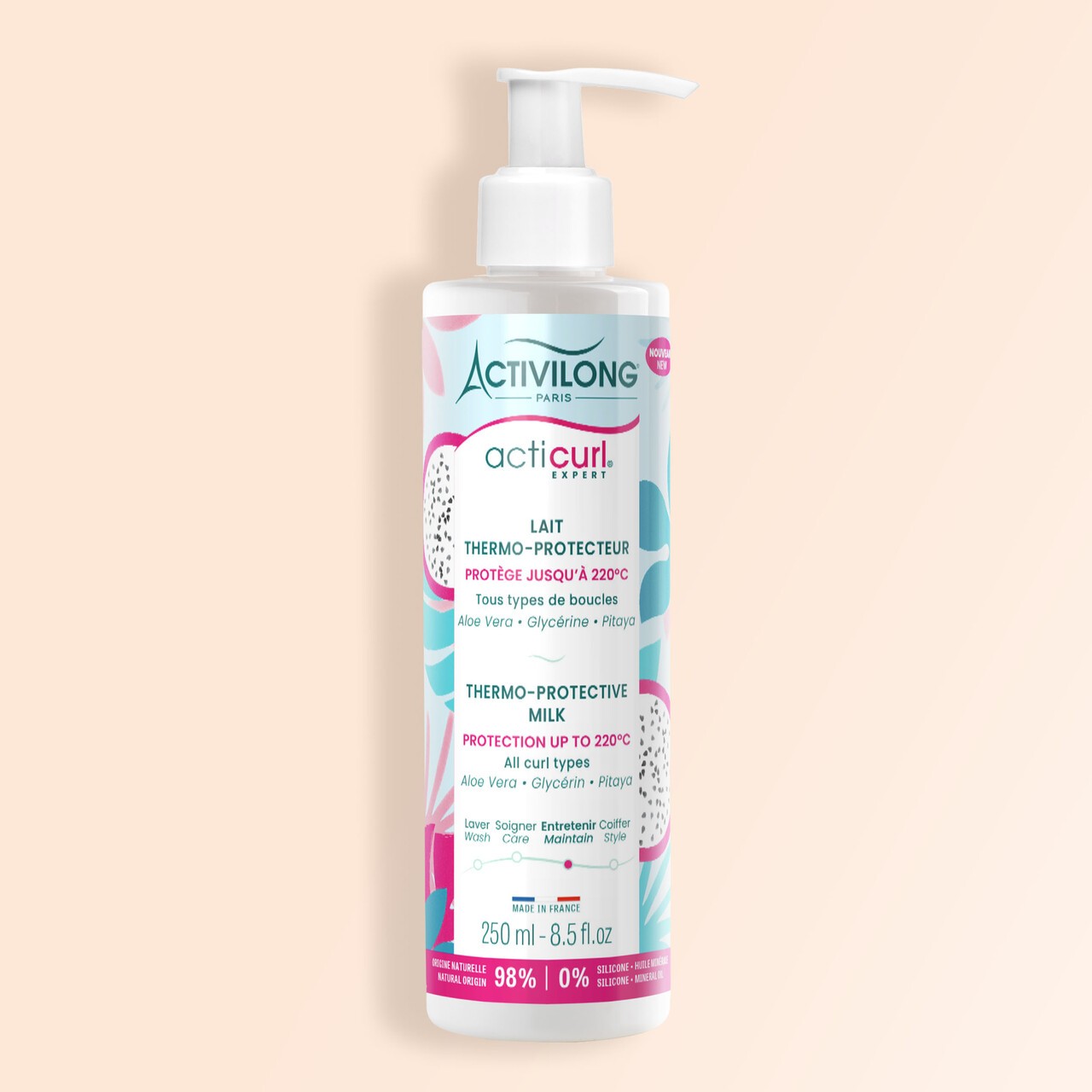 Packshot sur fond crème du flacon du lait thermo-protecteur Acticurl Expert pour cheveux bouclés