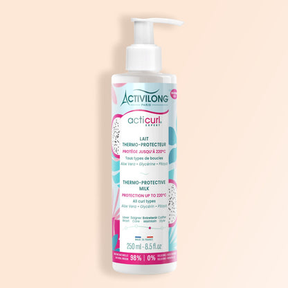 Packshot sur fond crème du flacon du lait thermo-protecteur Acticurl Expert pour cheveux bouclés