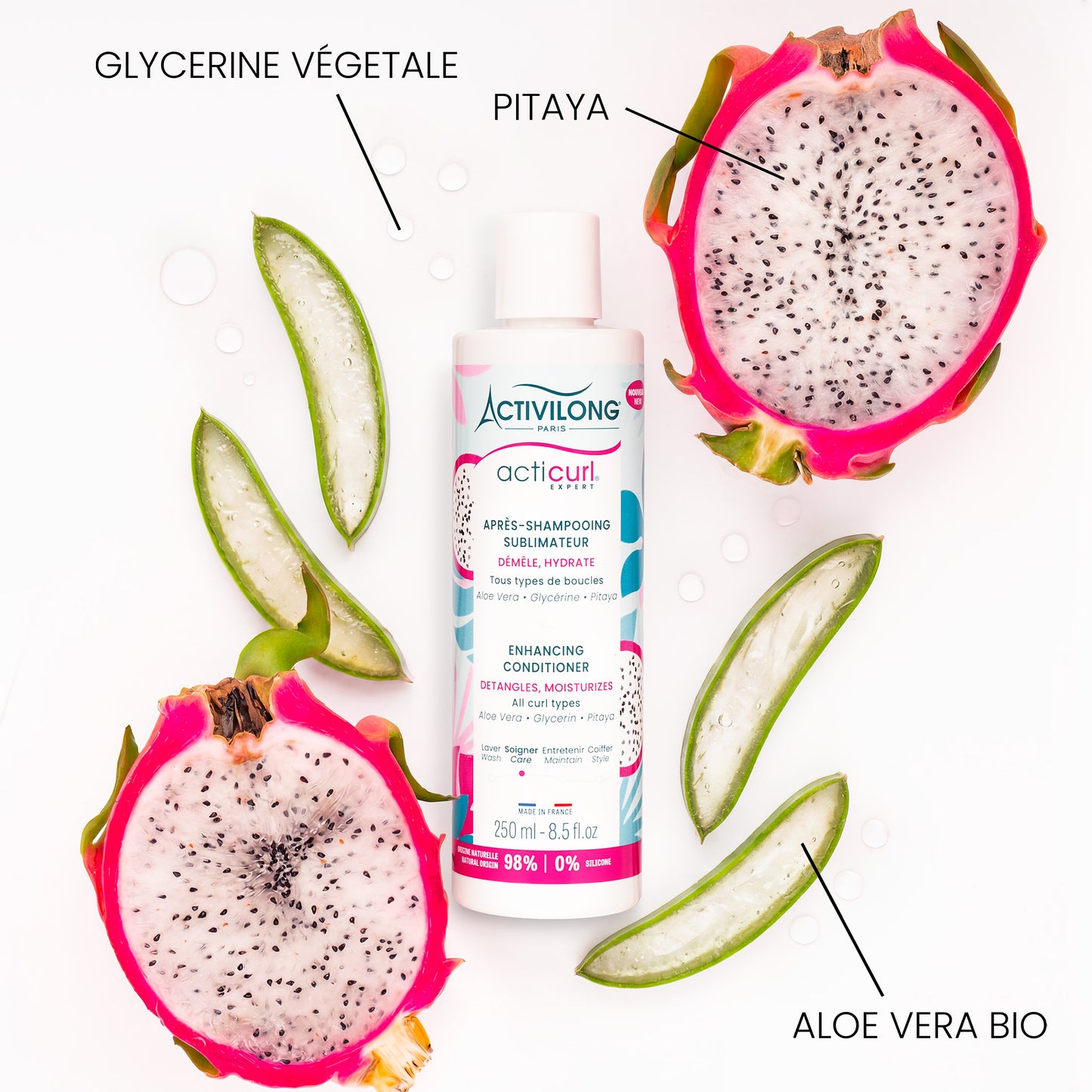 Visuel d'un Flacon de l'Après-Shampooing Sublimateur Acticurl Expert entouré de ses actifs glycérine végétale, pitaya et aloe vera bio